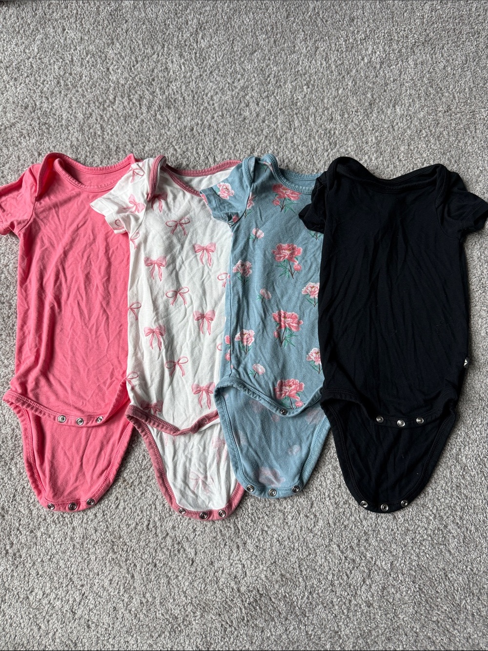 Kyte BABY Short-Sleeve One-Piece Bodysuit Set in Pink, White, Blue, Black